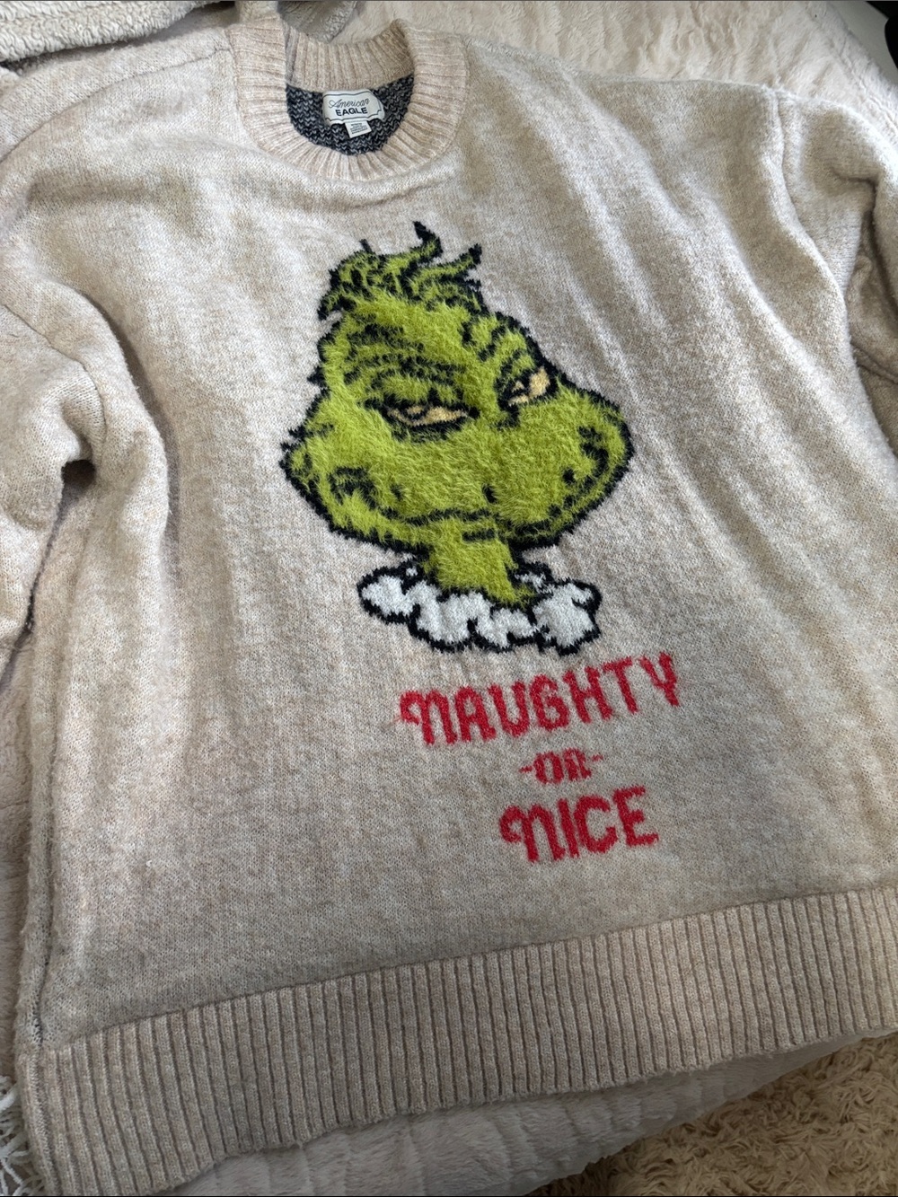 American Eagle Outfitters Beige Crewneck Sweater with Green Grinch Graphic